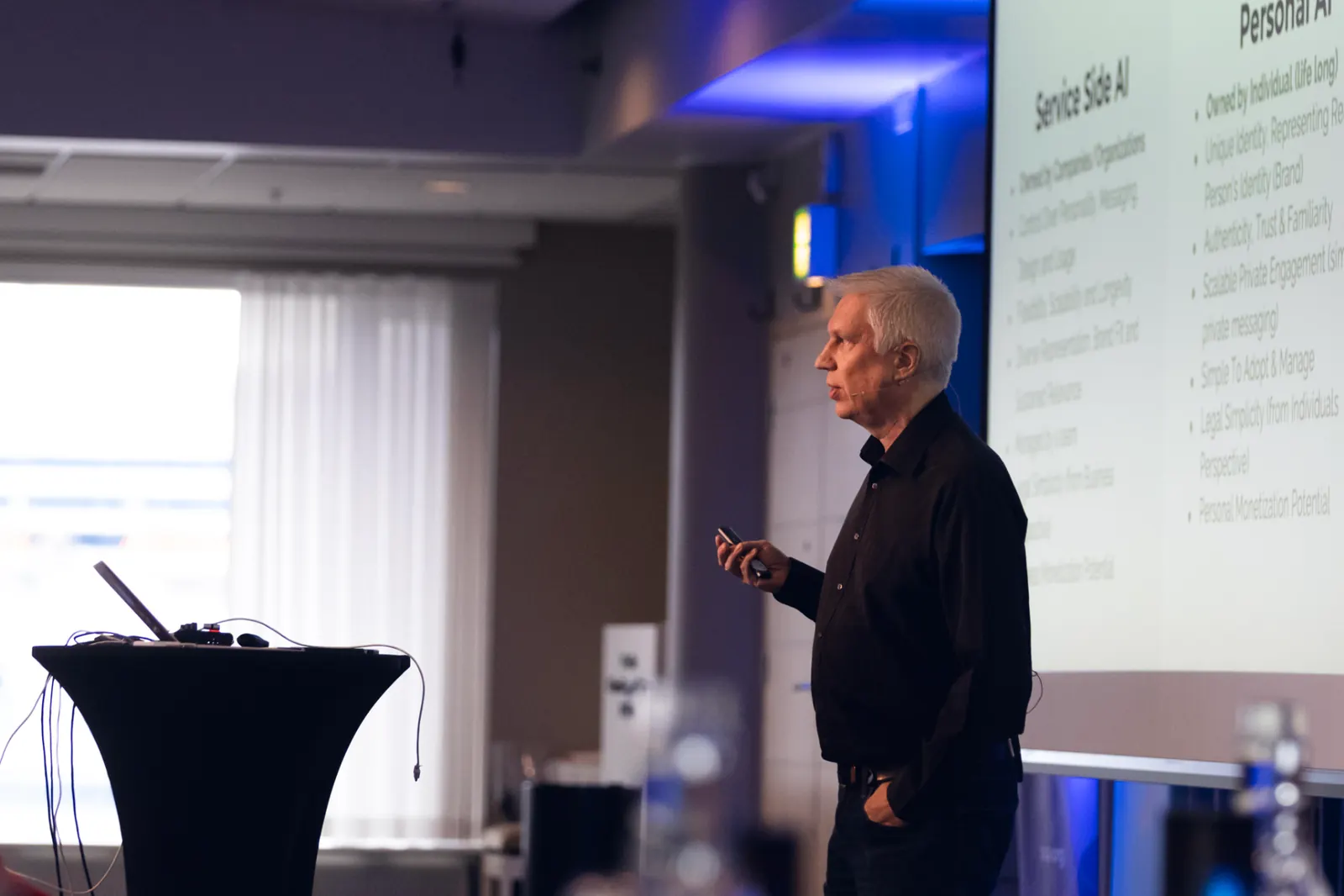 Valto Loikkanen speaking at an event